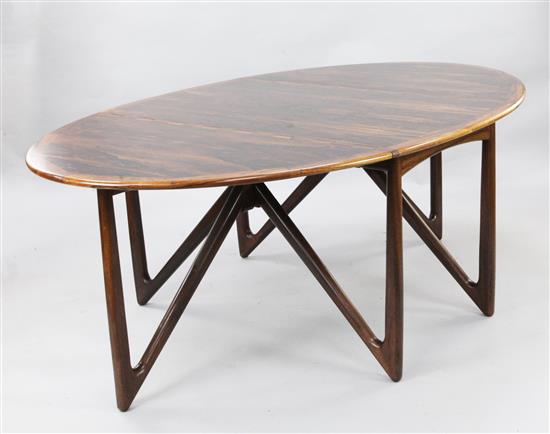 Kurt Ostervig for Jason Mobler. A Danish rosewood drop leaf dining table, Extends to 6ft 5in. x 4ft 3in. H.2ft 5in.